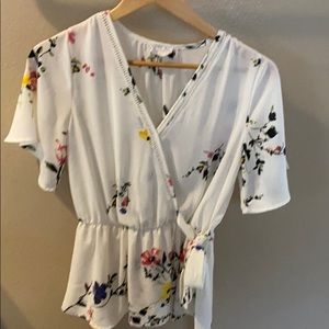 White top with flower designs